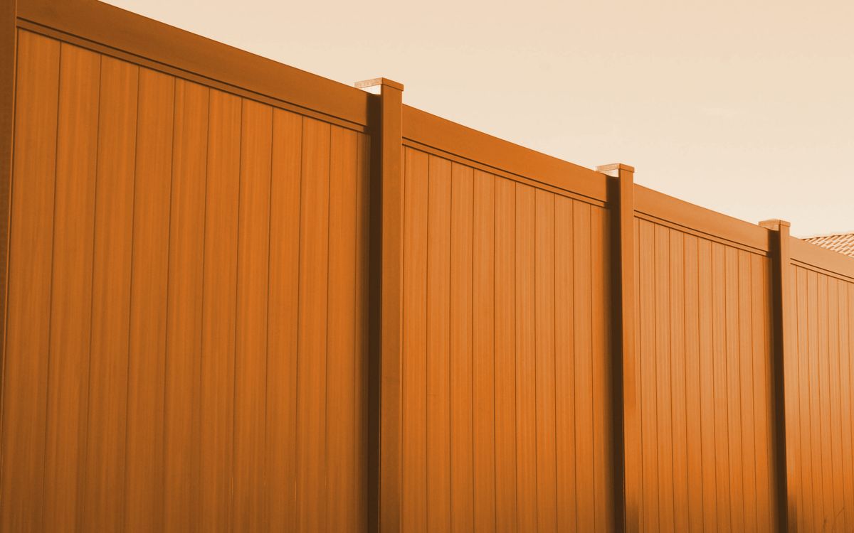 Close detail of vinyl fence panels and posts