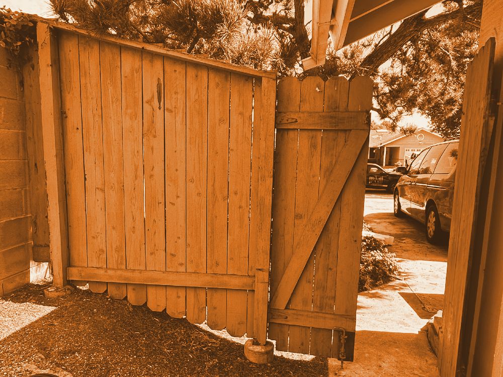 New vinyl gate installed by AG Vinyl Fencing