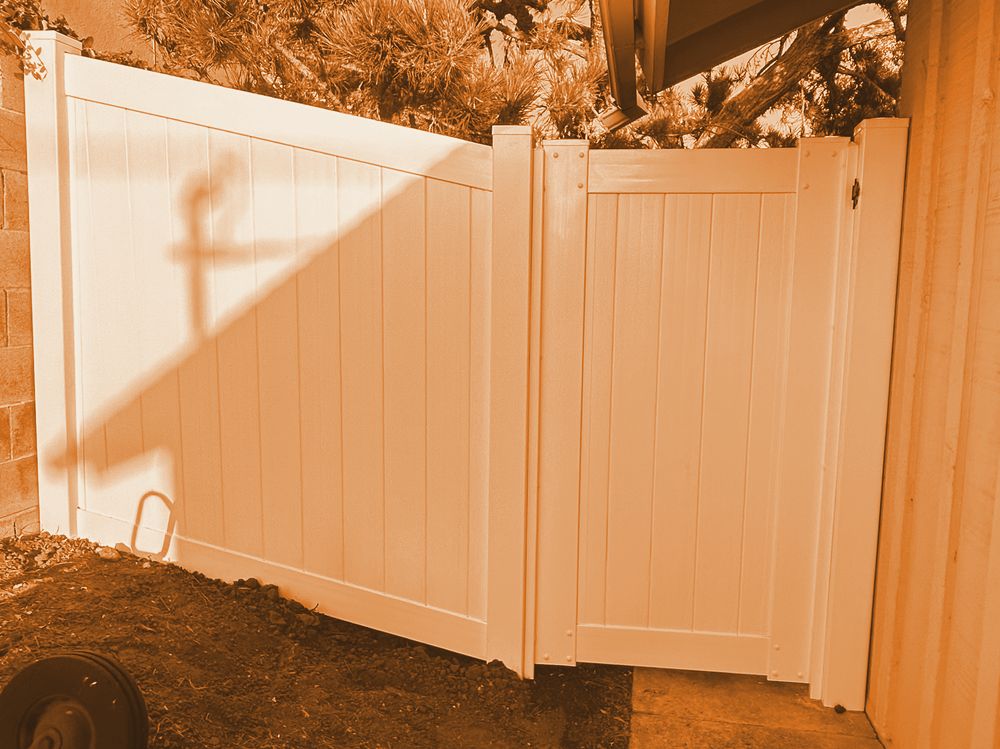 Old gate before AG Vinyl Fencing replaced it